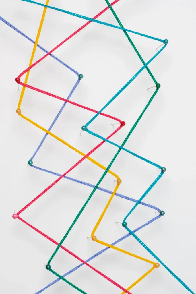 string art pattern hanging on a wall for decoration