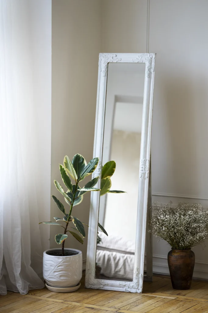 A bedroom with decorative mirrors