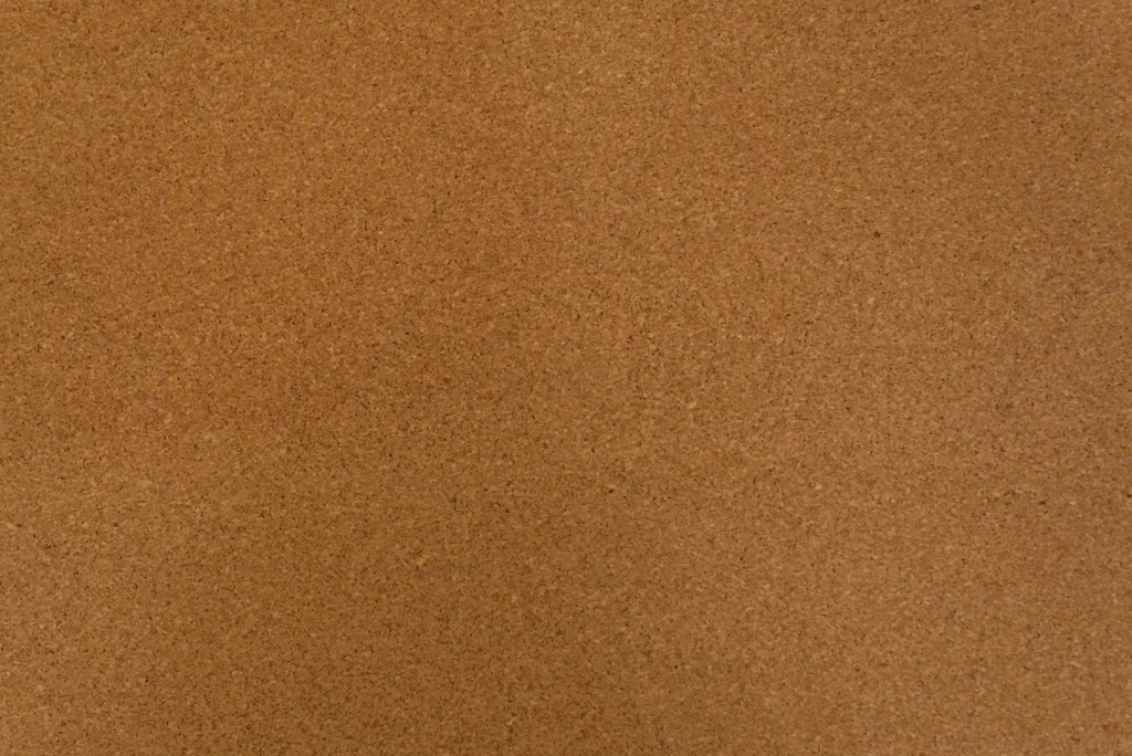 a corkboard background suitable to pin a photo, notes, and postcards